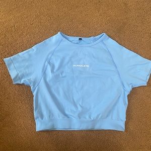 ALPHALETE -seamless short sleeve crop top Atlantis